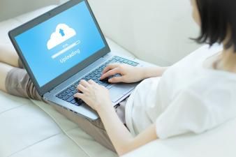 high-angle-view-woman-using-laptop-sofa-home(1).jpg